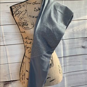 Grey workout pants with sheer bottom on front